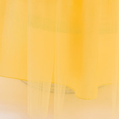 close-up of skirt hem on yellow princess costume